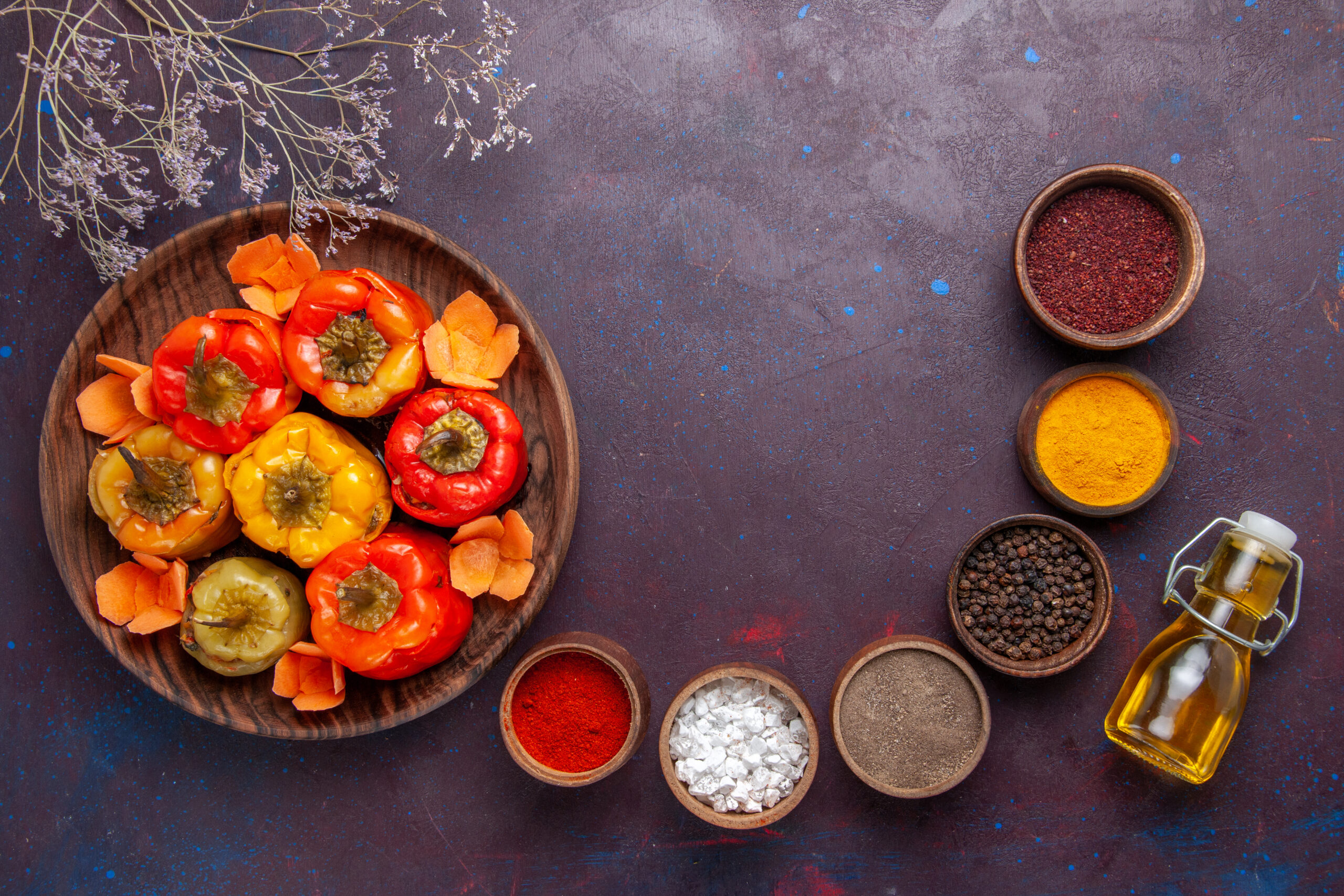 top-view-cooked-bell-peppers-with-different-seasonings-grey-surface-meal-vegetables-meat-dolma-food